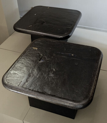 a pair of Paul Kingma black side tables