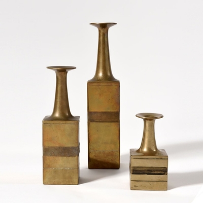 a set of three bronze Gambone vases